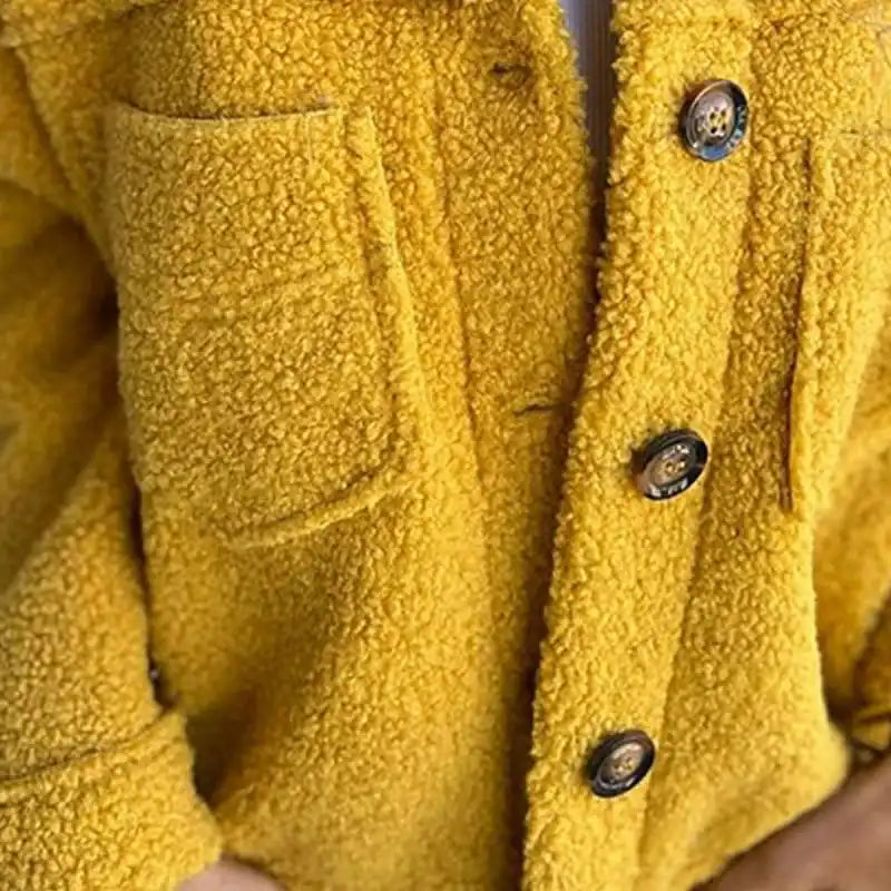 Modaura | Manteau en peau lainée